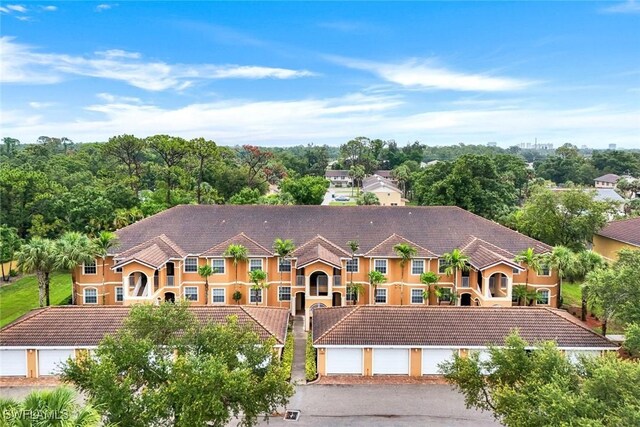 1089 Winding Pines Cir Unit 106, Cape Coral, FL 33909 - mediterranean / spanish-style home with a tiled roof and stucco siding