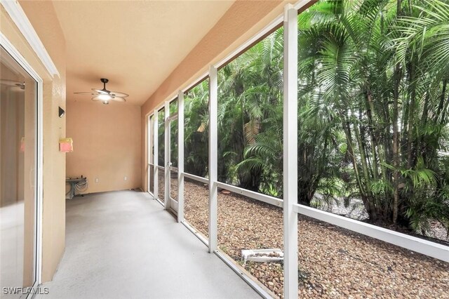 1089 Winding Pines Cir Unit 106, Cape Coral, FL 33909 - unfurnished sunroom featuring a ceiling fan