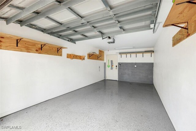 1089 Winding Pines Cir Unit 106, Cape Coral, FL 33909 - garage featuring a garage door opener