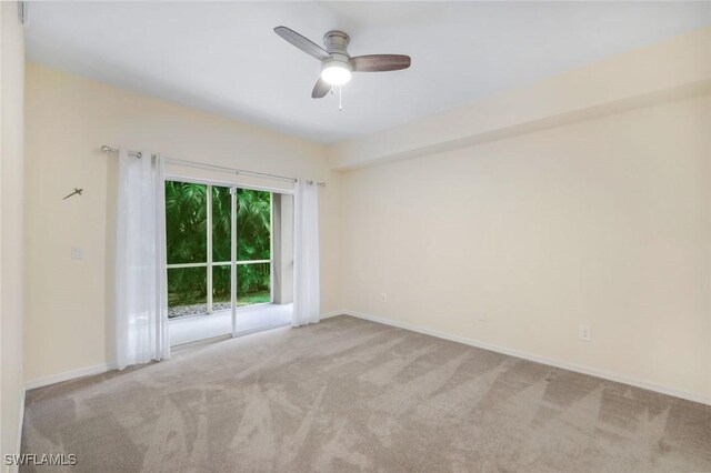1089 Winding Pines Cir Unit 106, Cape Coral, FL 33909 - carpeted spare room with a ceiling fan and baseboards