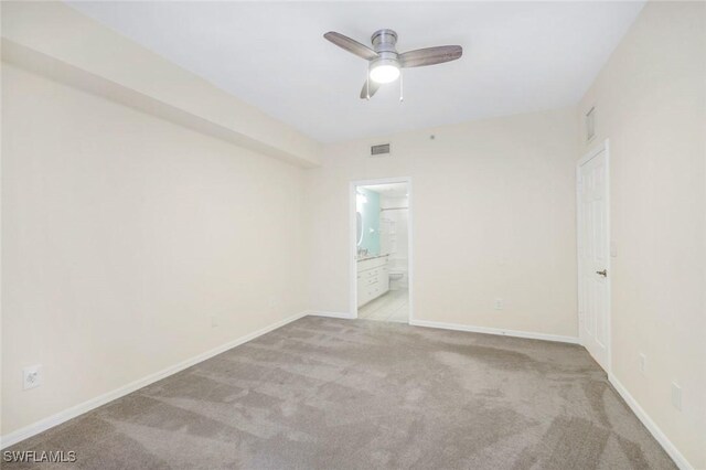 1089 Winding Pines Cir Unit 106, Cape Coral, FL 33909 - carpeted spare room with a ceiling fan and baseboards