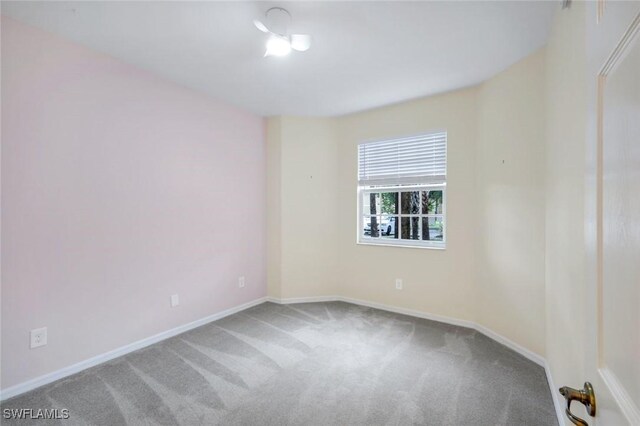 1089 Winding Pines Cir Unit 106, Cape Coral, FL 33909 - empty room with carpet floors and baseboards