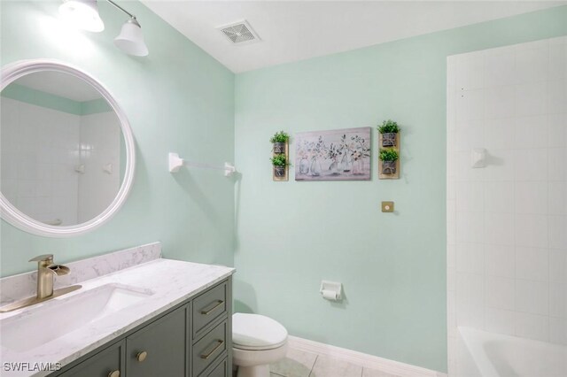1089 Winding Pines Cir Unit 106, Cape Coral, FL 33909 - bathroom with vanity, tile patterned flooring, and  shower combination