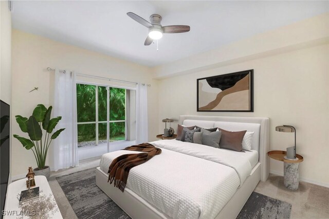 1089 Winding Pines Cir Unit 106, Cape Coral, FL 33909 - carpeted bedroom with a ceiling fan and baseboards
