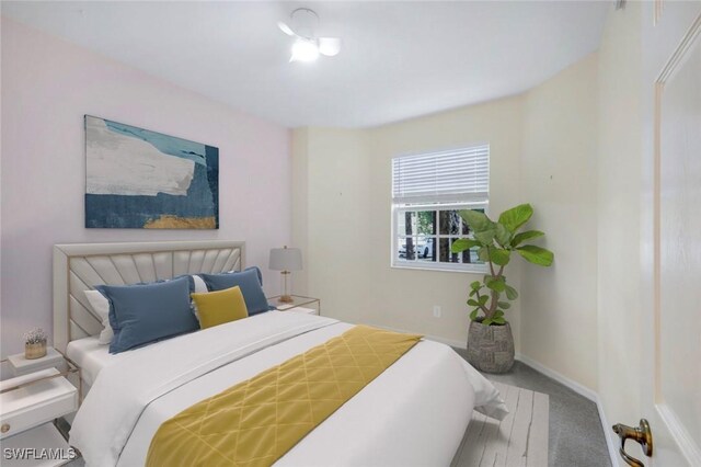 1089 Winding Pines Cir Unit 106, Cape Coral, FL 33909 - carpeted bedroom featuring baseboards