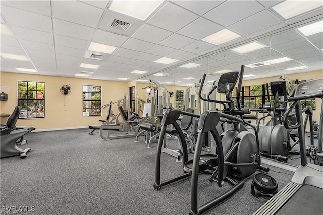 1089 Winding Pines Cir Unit 106, Cape Coral, FL 33909 - gym featuring a drop ceiling and baseboards