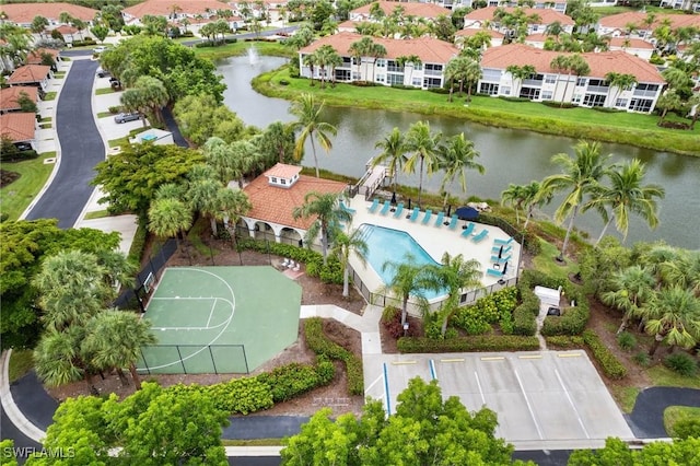 10921 Santa Margherita Rd Unit 104, Estero, FL 34135 - drone / aerial view of a large body of water and a pool area