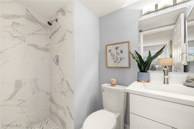 548 Broad Ave S Unit 548, Naples, FL 34102 - full bathroom with vanity, a tile shower, and toilet