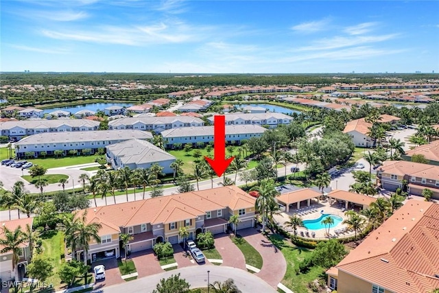 12101 Mahogany Cove St, Fort Myers, FL 33913 - aerial perspective of suburban area featuring a large body of water and a pool