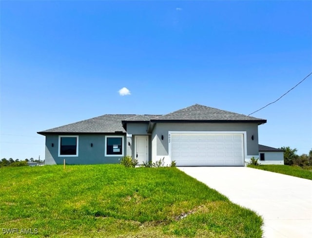 6032 Keystone Cir, Labelle, FL 33935 - single story home featuring stucco siding, an attached garage, concrete driveway, and a front yard