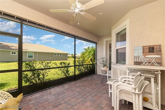 3130 Scarlet Oak Pl, North Fort Myers, FL 33903 - sunroom / solarium with ceiling fan and healthy amount of natural light