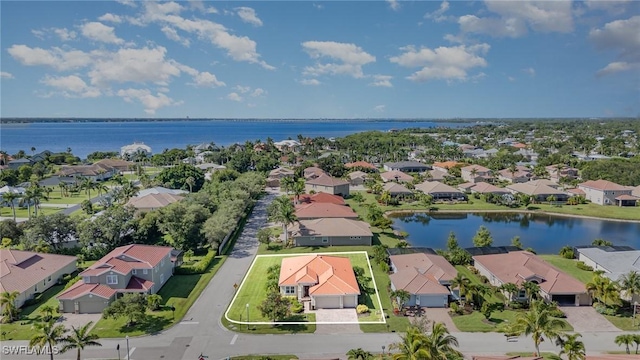 3130 Scarlet Oak Pl, North Fort Myers, FL 33903 - aerial perspective of suburban area featuring a large body of water