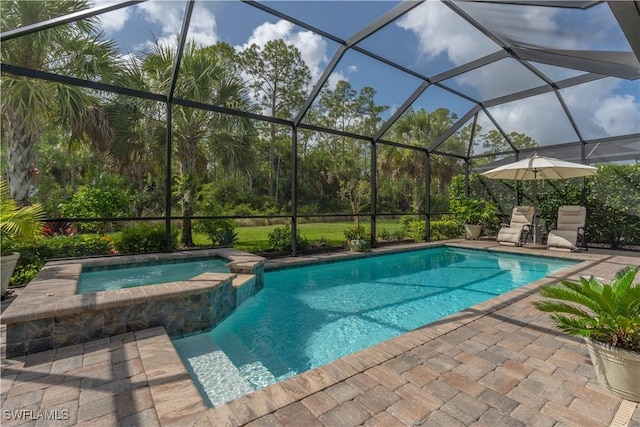 6848 Winding Cypress Dr, Naples, FL 34114 - view of swimming pool with a pool with connected hot tub, a patio, and glass enclosure