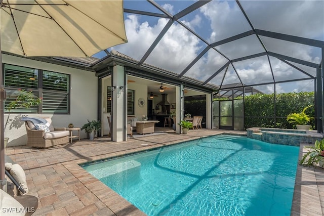 6848 Winding Cypress Dr, Naples, FL 34114 - view of pool featuring a patio, a pool with connected hot tub, a ceiling fan, and a lanai