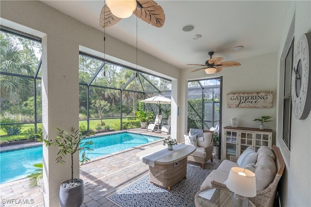 6848 Winding Cypress Dr, Naples, FL 34114 - outdoor pool with a ceiling fan, a patio, and a lanai
