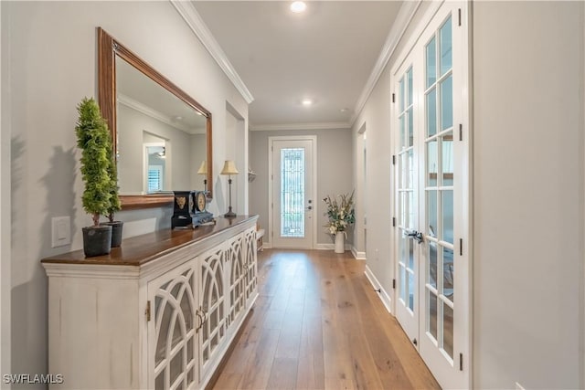 6848 Winding Cypress Dr, Naples, FL 34114 - entryway featuring light wood-type flooring, recessed lighting, french doors, baseboards, and crown molding
