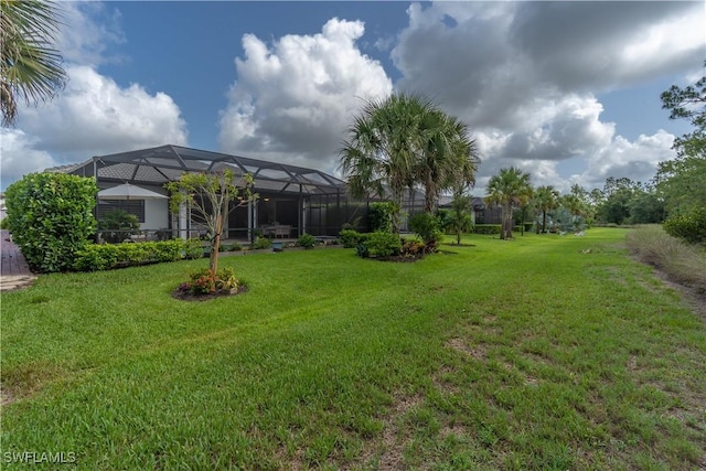 6848 Winding Cypress Dr, Naples, FL 34114 - view of grassy yard featuring a lanai