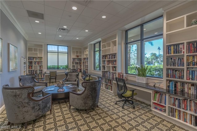 6848 Winding Cypress Dr, Naples, FL 34114 - sitting room with crown molding, built in features, and a desk
