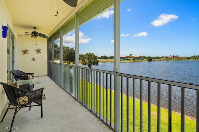25057 Peacock Ln Unit 202, Naples, FL 34114 - balcony with ceiling fan and a water view