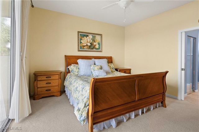 25057 Peacock Ln Unit 202, Naples, FL 34114 - bedroom featuring light colored carpet, access to outside, and ceiling fan