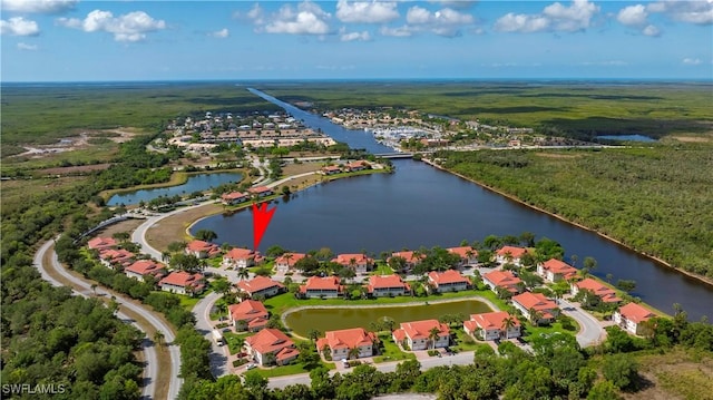 25057 Peacock Ln Unit 202, Naples, FL 34114 - aerial perspective of suburban area with a nearby body of water