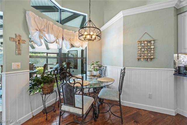 520 Raven Way, Naples, FL 34110 - dining space featuring wainscoting, a chandelier, and wood finished floors