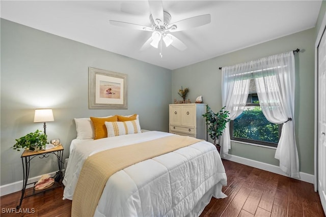 520 Raven Way, Naples, FL 34110 - bedroom with baseboards, wood finished floors, and ceiling fan