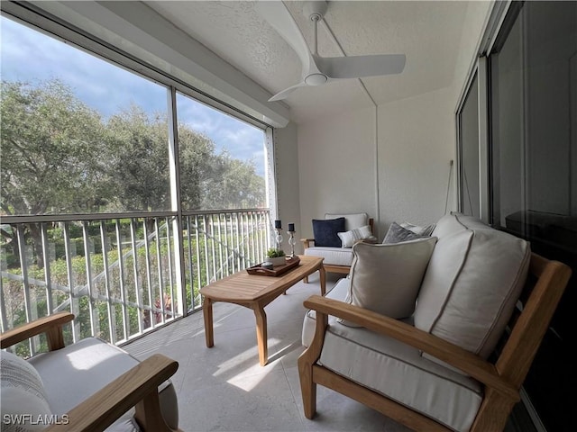 7087 Barrington Cir Unit 201, Naples, FL 34108 - sunroom with ceiling fan and an outdoor living space