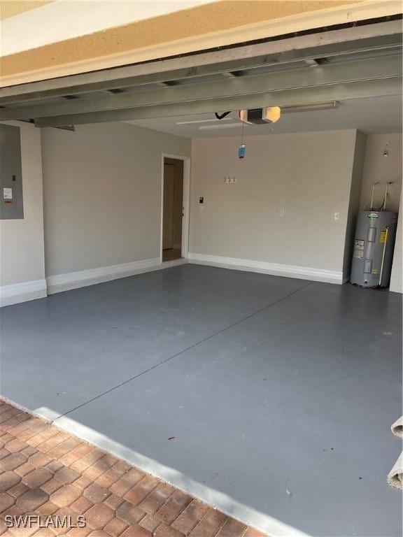 10427 Carolina Willow Dr, Fort Myers, FL 33913 - garage featuring water heater, electric panel, a garage door opener, and baseboards