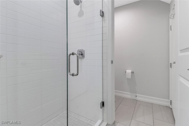 7501 Carnegie Way, Naples, FL 34119 - full bath with a stall shower and baseboards
