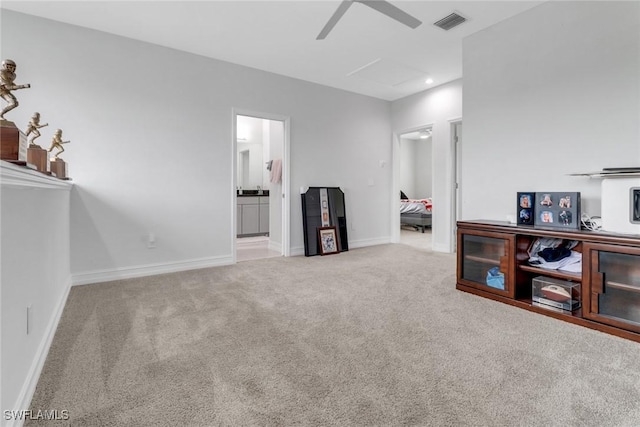 7501 Carnegie Way, Naples, FL 34119 - empty room with attic access, carpet floors, a ceiling fan, and baseboards