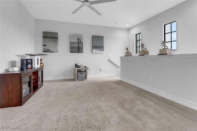 7501 Carnegie Way, Naples, FL 34119 - unfurnished living room with carpet flooring, ceiling fan, baseboards, and recessed lighting