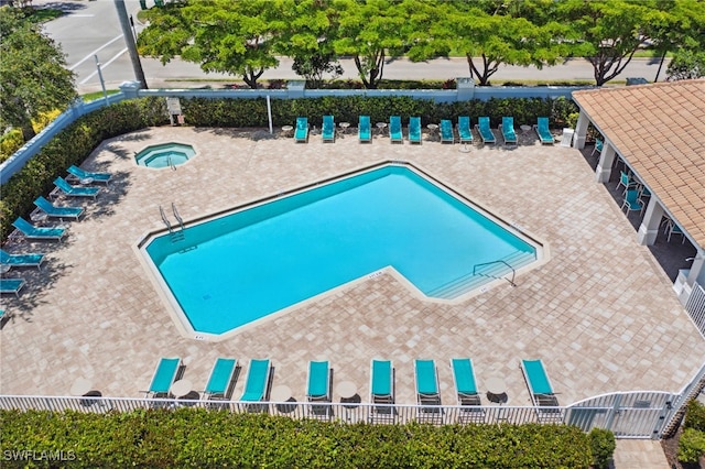 15873 Marcello Cir Unit 76, Naples, FL 34110 - community pool with a hot tub