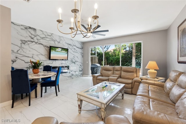 15873 Marcello Cir Unit 76, Naples, FL 34110 - living area with a chandelier and an accent wall