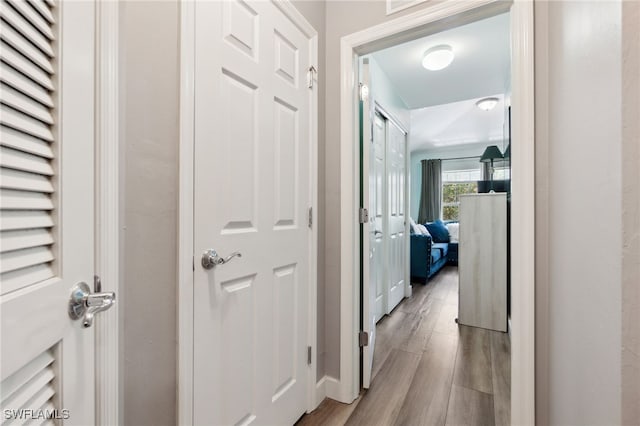 15873 Marcello Cir Unit 76, Naples, FL 34110 - hall with wood finished floors