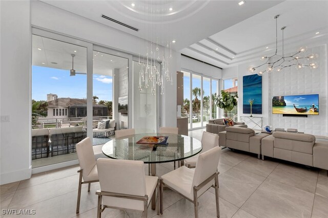 432 Bayside Ave, Naples, FL 34108 - tiled dining space featuring a chandelier and recessed lighting