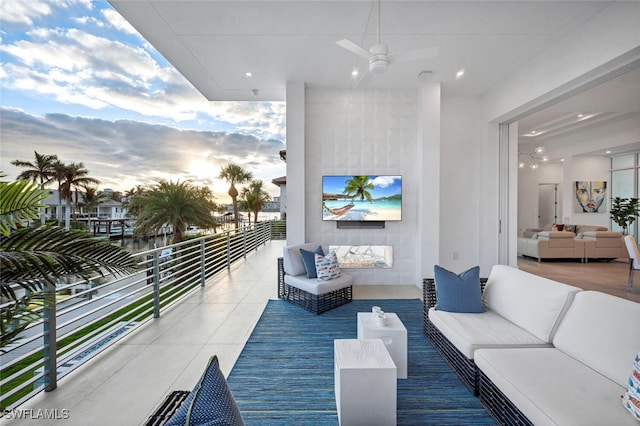 432 Bayside Ave, Naples, FL 34108 - balcony with an outdoor living space and a ceiling fan