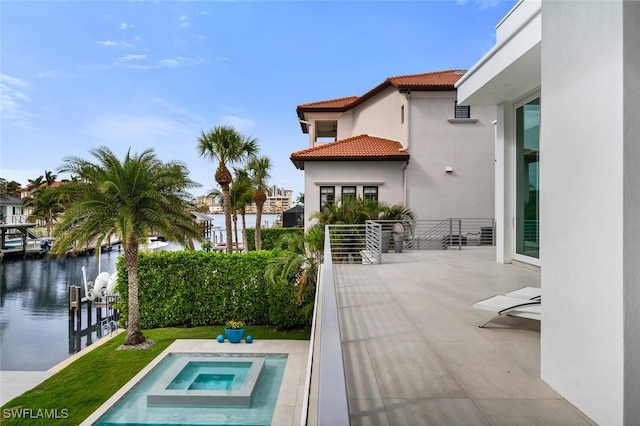 432 Bayside Ave, Naples, FL 34108 - view of pool with an in-ground hot tub and a water view