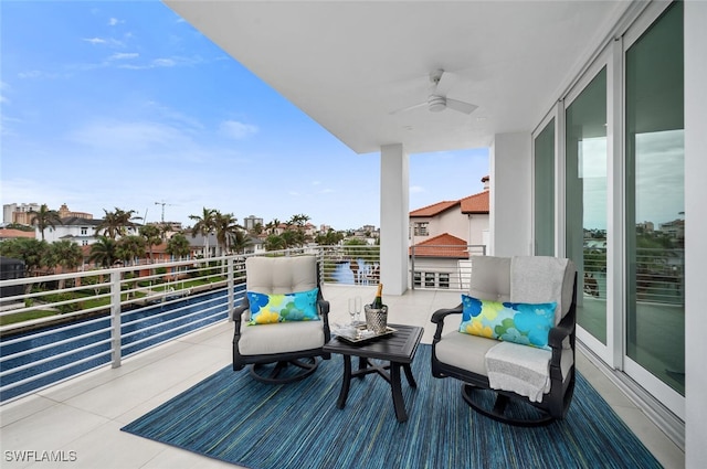 432 Bayside Ave, Naples, FL 34108 - balcony featuring a ceiling fan and a residential view