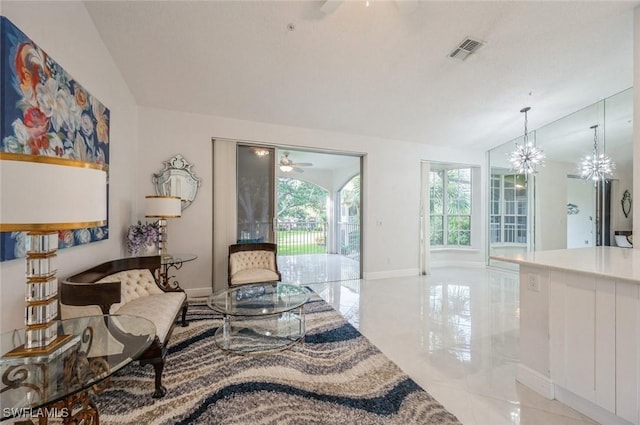 74 Silver Oaks Cir Unit 9-202, Naples, FL 34119 - living area with baseboards, lofted ceiling, and ceiling fan