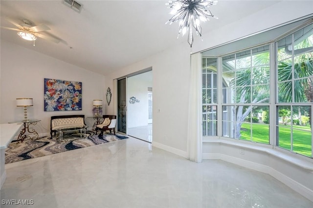 74 Silver Oaks Cir Unit 9-202, Naples, FL 34119 - unfurnished living room with vaulted ceiling, baseboards, and ceiling fan