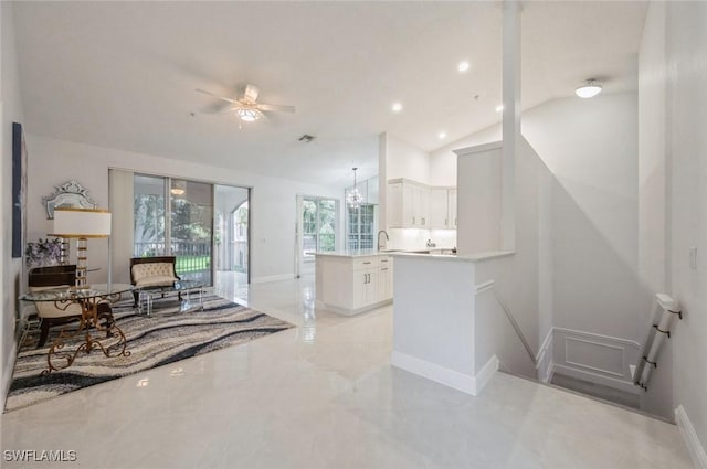 74 Silver Oaks Cir Unit 9-202, Naples, FL 34119 - living room featuring vaulted ceiling, a ceiling fan, baseboards, and recessed lighting