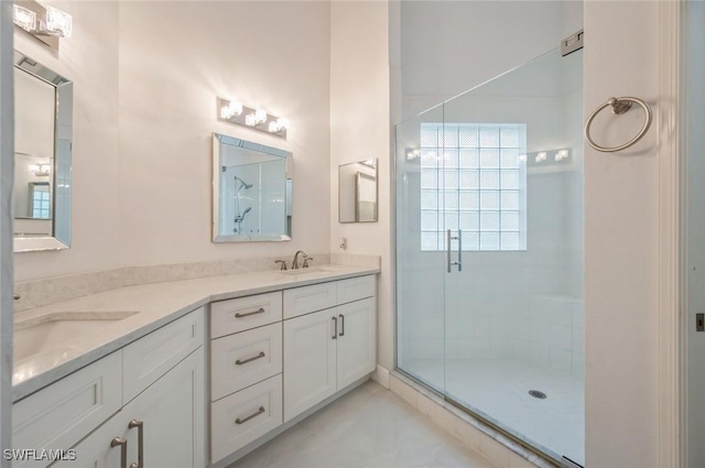 74 Silver Oaks Cir Unit 9-202, Naples, FL 34119 - full bathroom featuring a shower stall and double vanity