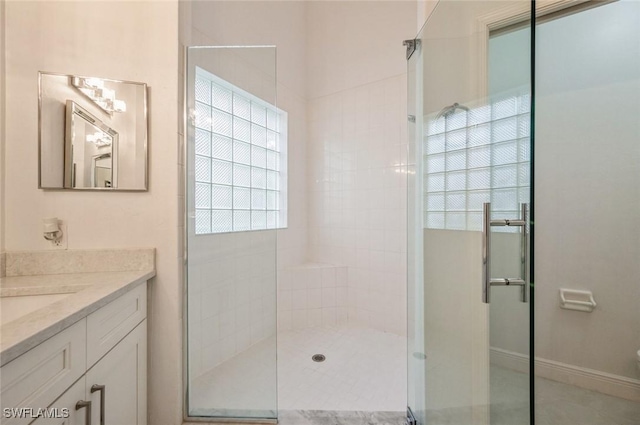 74 Silver Oaks Cir Unit 9-202, Naples, FL 34119 - full bathroom with a shower stall, vanity, and toilet