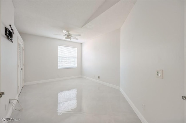 74 Silver Oaks Cir Unit 9-202, Naples, FL 34119 - unfurnished bedroom featuring ceiling fan and baseboards