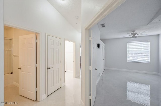74 Silver Oaks Cir Unit 9-202, Naples, FL 34119 - hall featuring baseboards