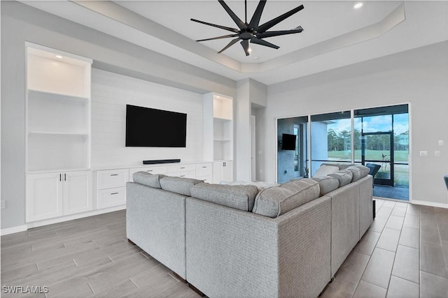 15889 Cranes Marsh Ct, Punta Gorda, FL 33982 - living room featuring baseboards, built in shelves, a ceiling fan, recessed lighting, and light wood finished floors