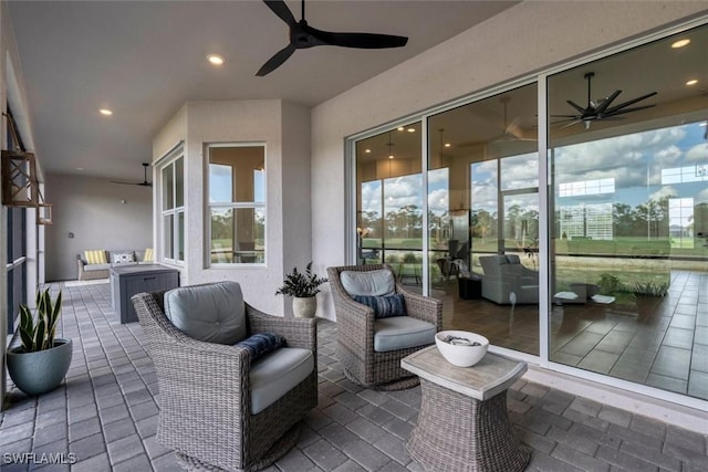 15889 Cranes Marsh Ct, Punta Gorda, FL 33982 - view of patio / terrace featuring a ceiling fan and an outdoor hangout area