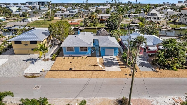 250 Ohio Ave, Fort Myers Beach, FL 33931 - aerial perspective of suburban area featuring a large body of water