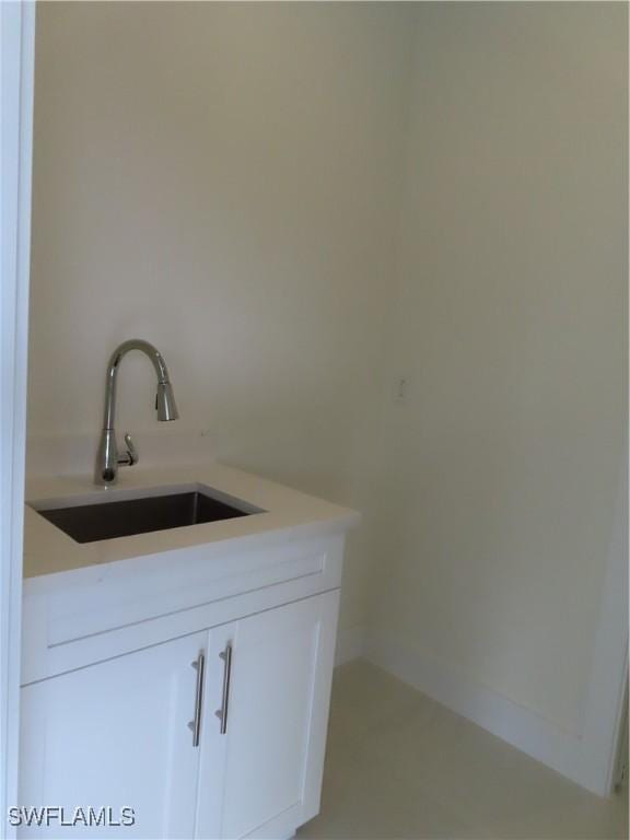 4132 64th Ave NE, Naples, FL 34120 - laundry area featuring a sink